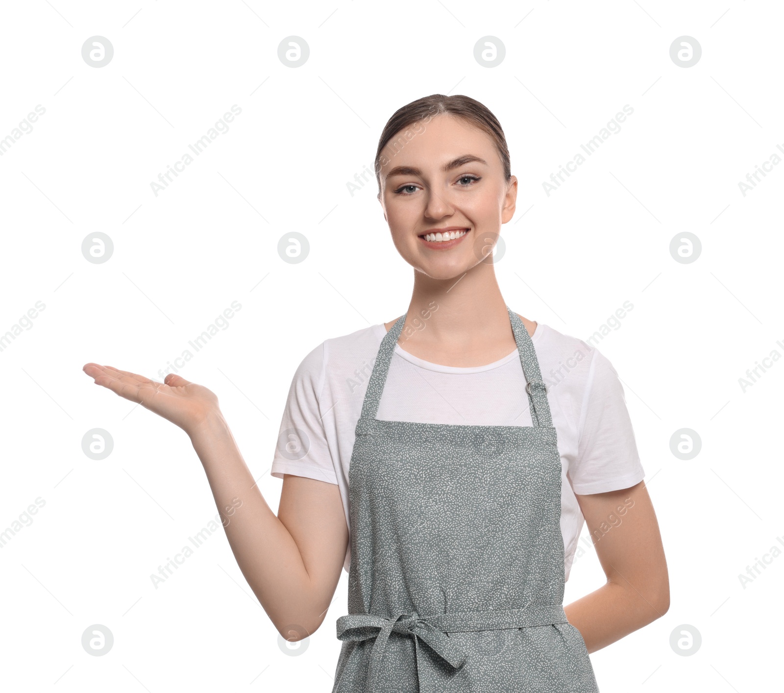 Photo of Beautiful young woman in clean apron on white background