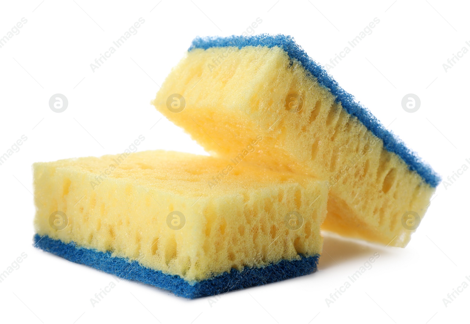 Photo of Yellow cleaning sponges with abrasive light blue scourers on white background