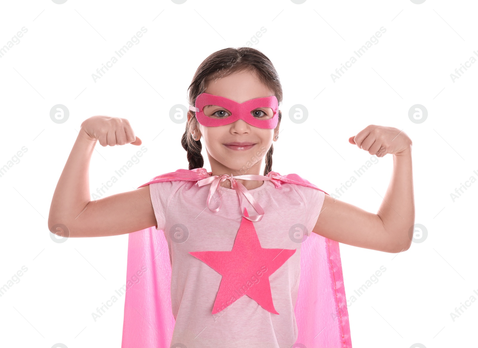 Photo of Cute little girl in superhero suit on white background