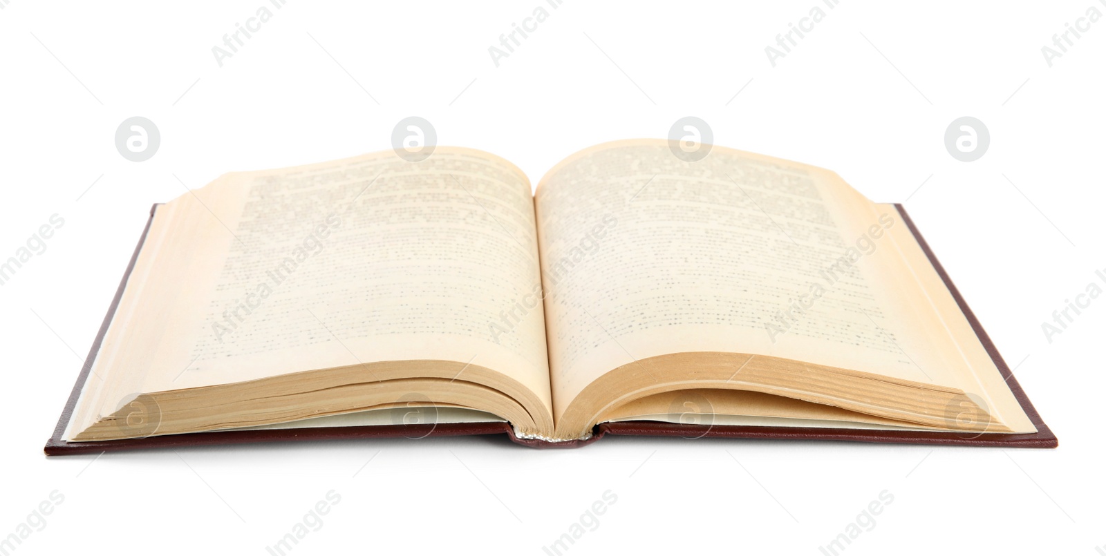 Photo of Open old hardcover book isolated on white