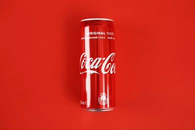 Photo of MYKOLAIV, UKRAINE - NOVEMBER 14, 2018: Coca-Cola can on color background, top view