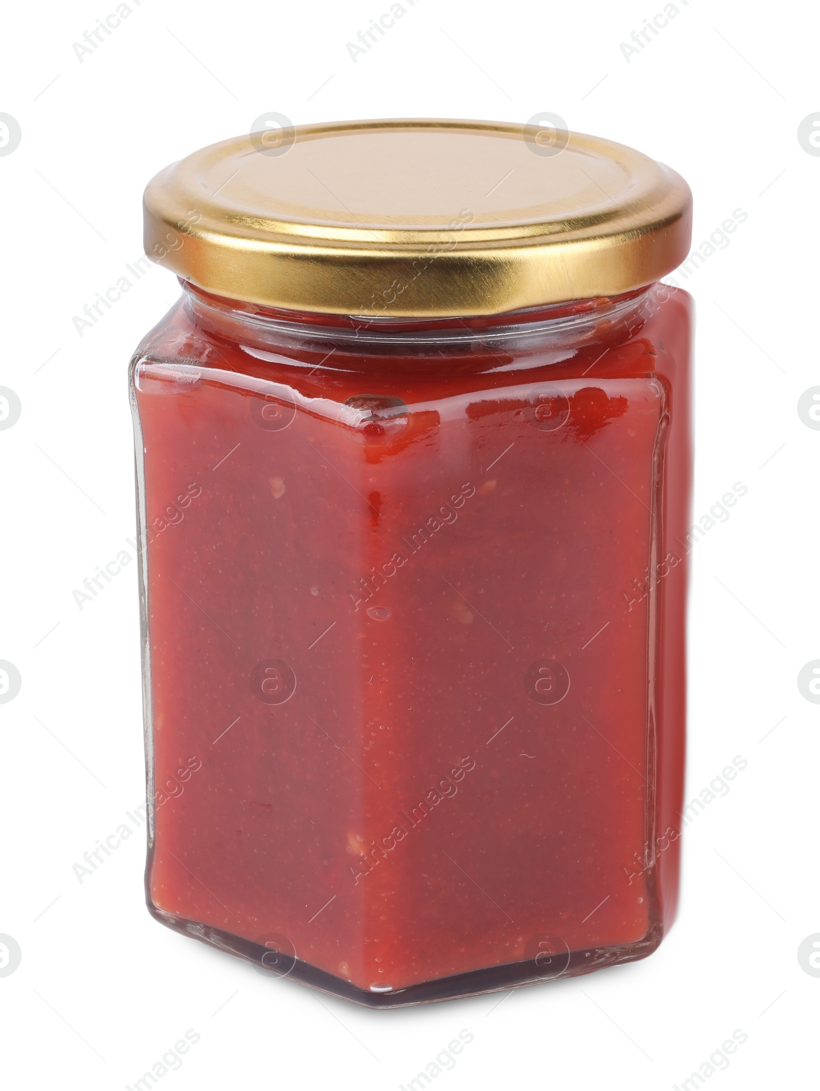 Photo of Organic ketchup in glass jar isolated on white. Tomato sauce