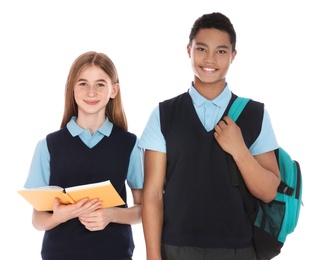 Portrait of teenagers in school uniform on white background