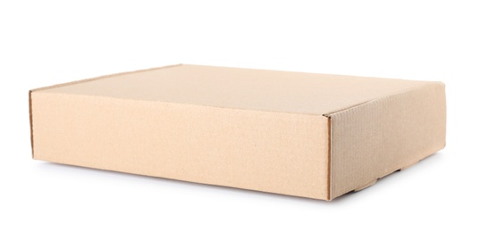 Photo of Closed cardboard box on white background. Mockup for design