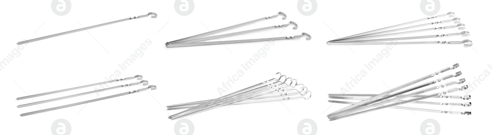 Image of Set with metal skewers on white background. Banner design