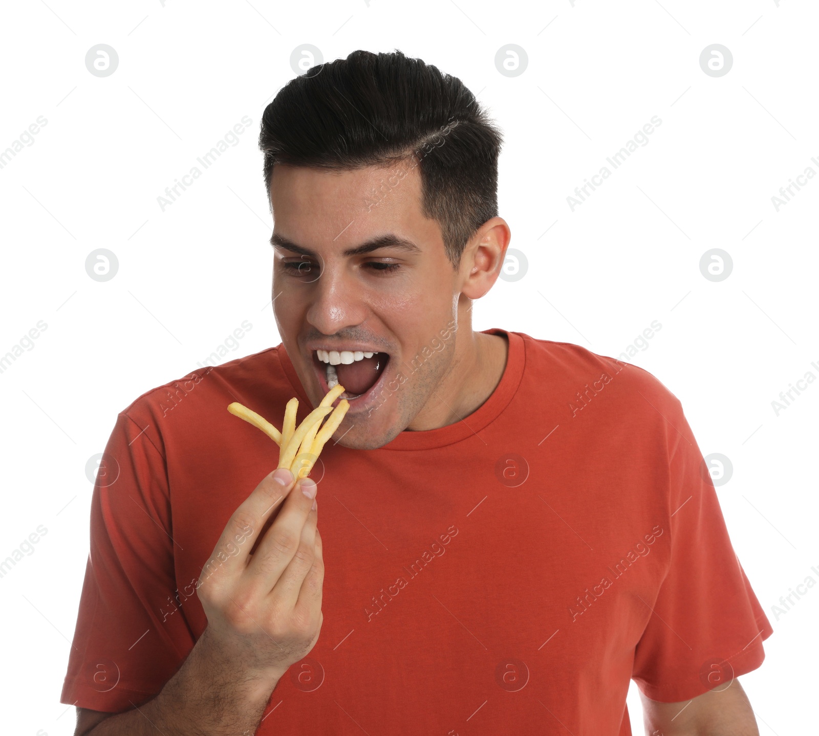 Photo of Man eating French fries on white background