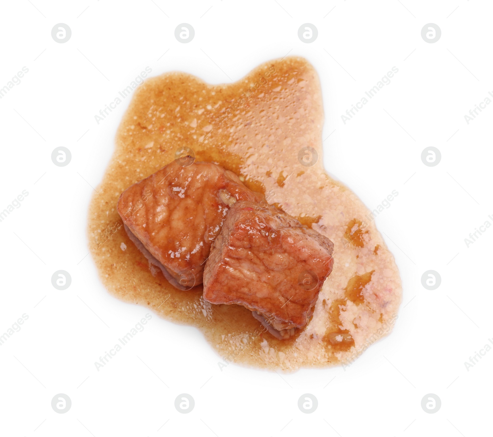 Photo of Pieces of delicious cooked beef isolated on white, top view. Tasty goulash