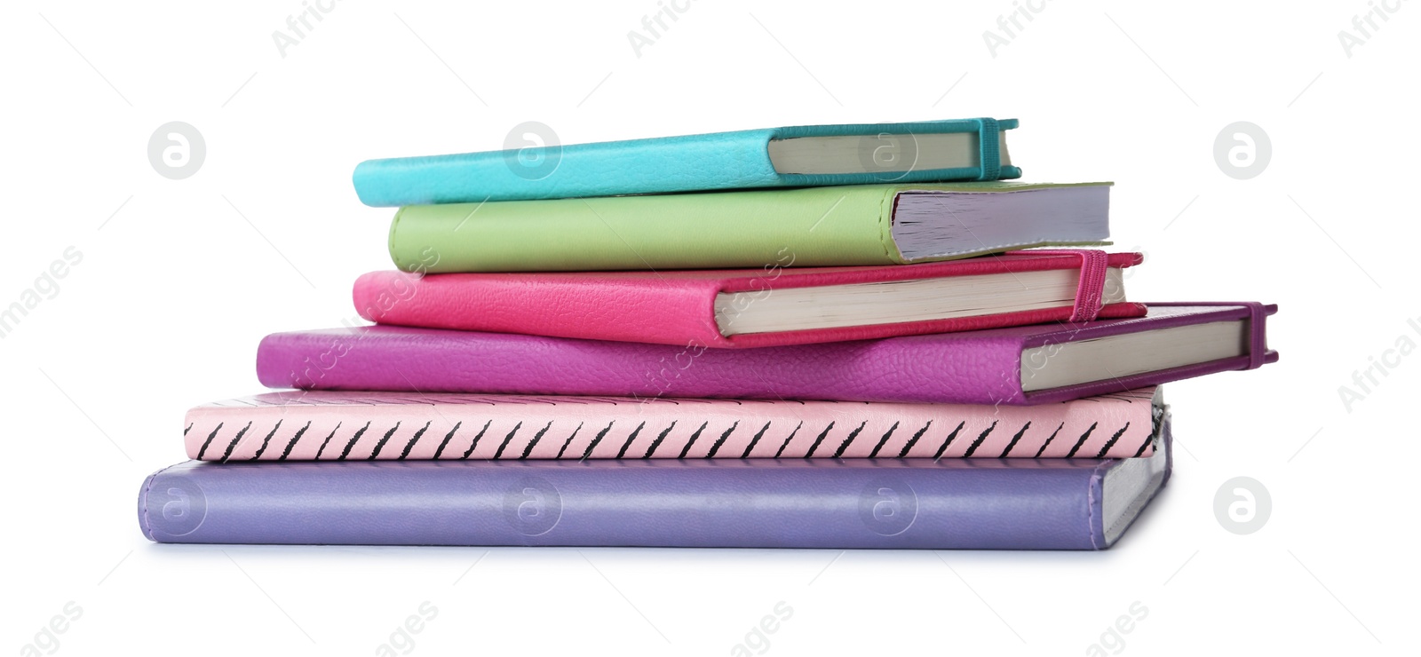 Photo of Stack of hardcover notebooks isolated on white
