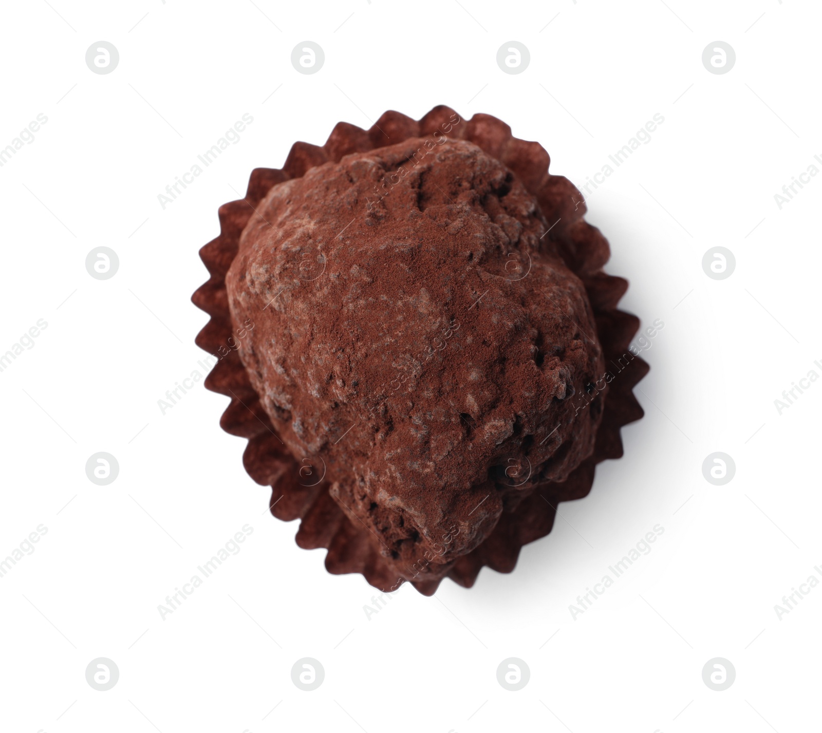 Photo of Tasty chocolate truffle candy isolated on white, top view