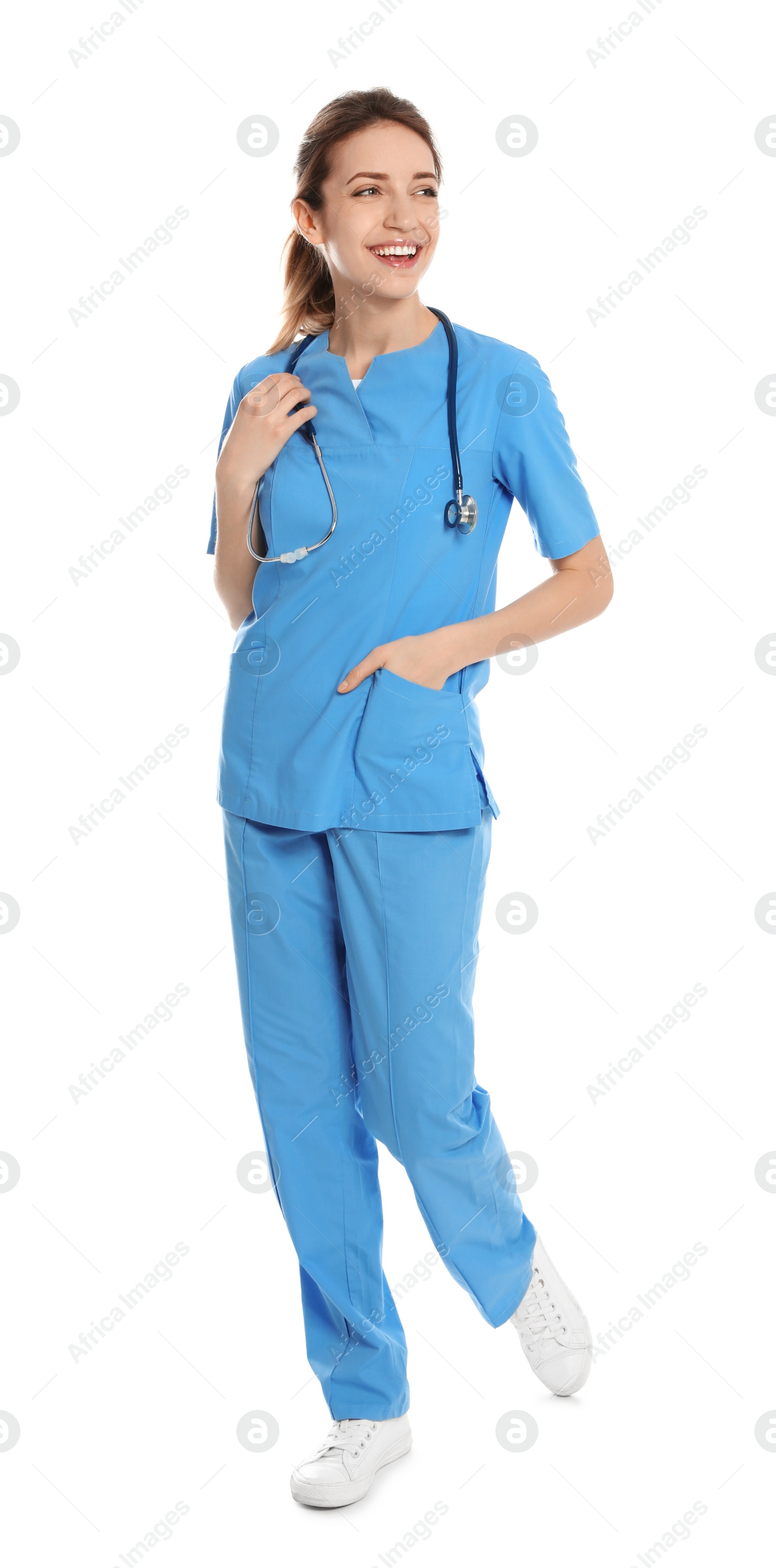 Photo of Full length portrait of medical doctor with stethoscope isolated on white