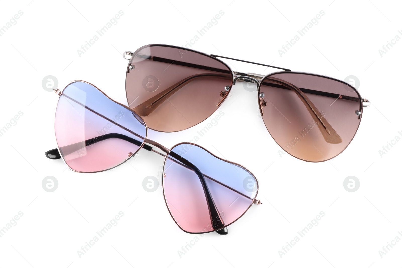 Photo of Different stylish sunglasses on white background. Sun protection