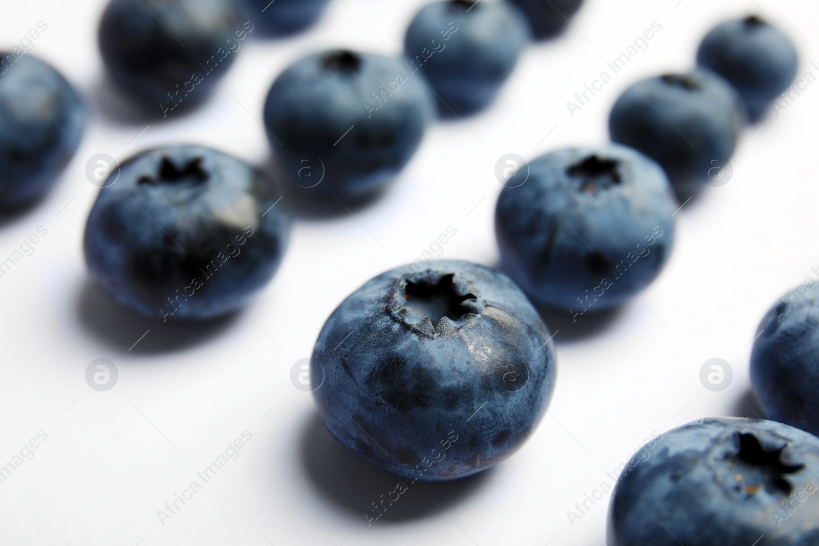 Photo of Tasty blueberry on white background, closeup