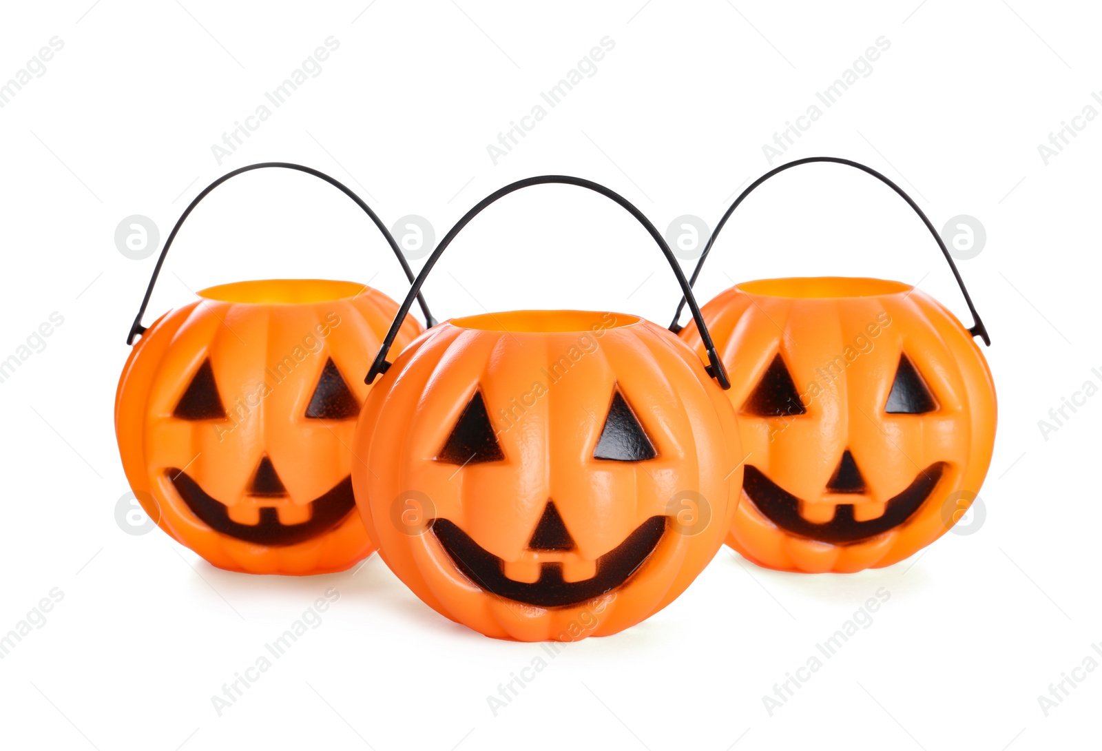Photo of Halloween trick or treat buckets isolated on white