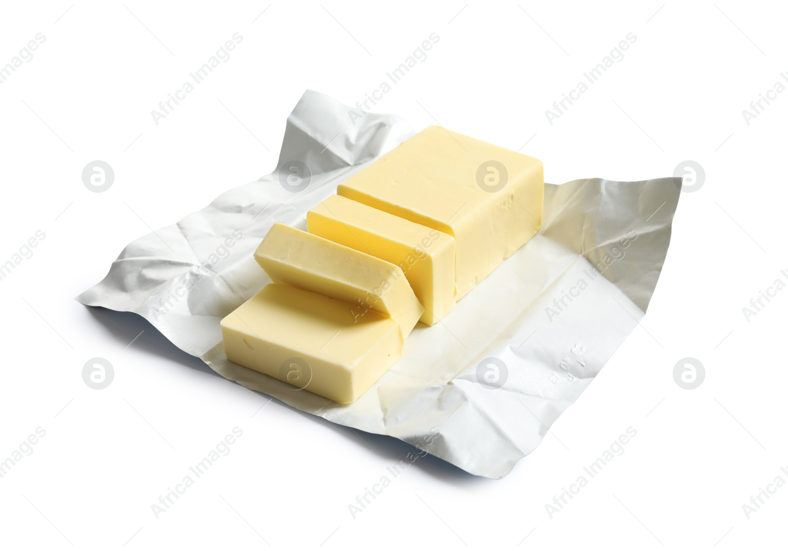 Photo of Cut block of fresh butter with wrapper on white background