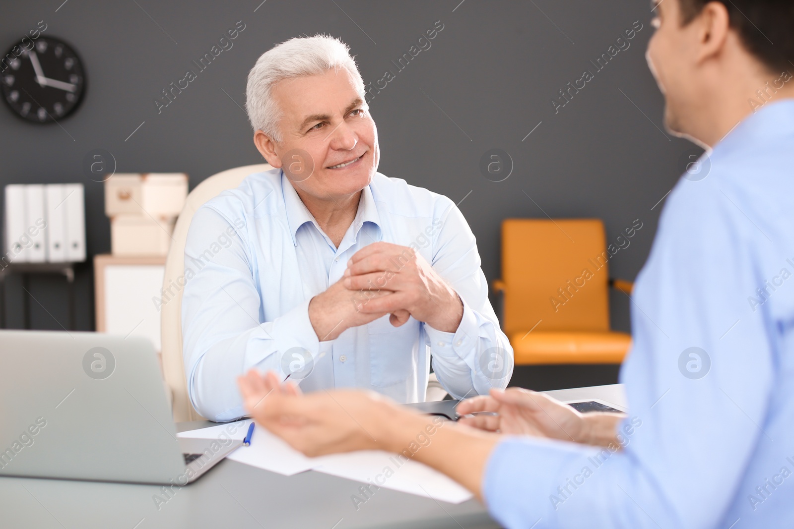 Photo of Human resources manager conducting job interview with applicant in office