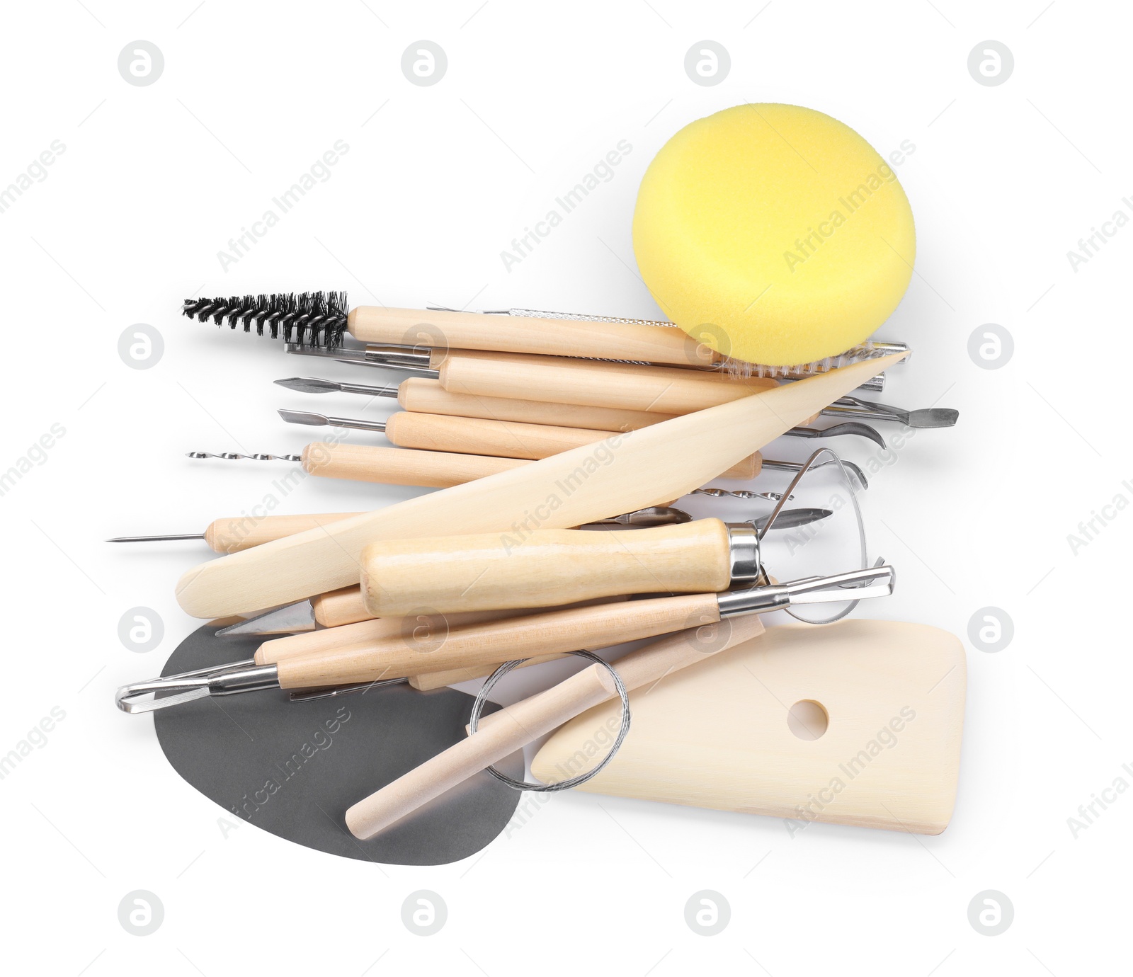 Photo of Set of different clay crafting tools isolated on white, top view