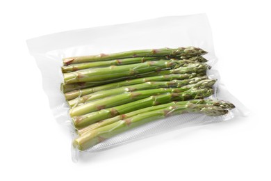 Photo of Vacuum pack of asparagus isolated on white