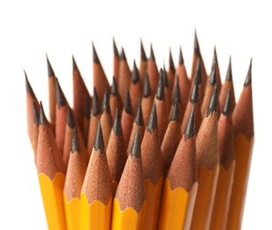 Photo of Many sharp graphite pencils isolated on white, closeup