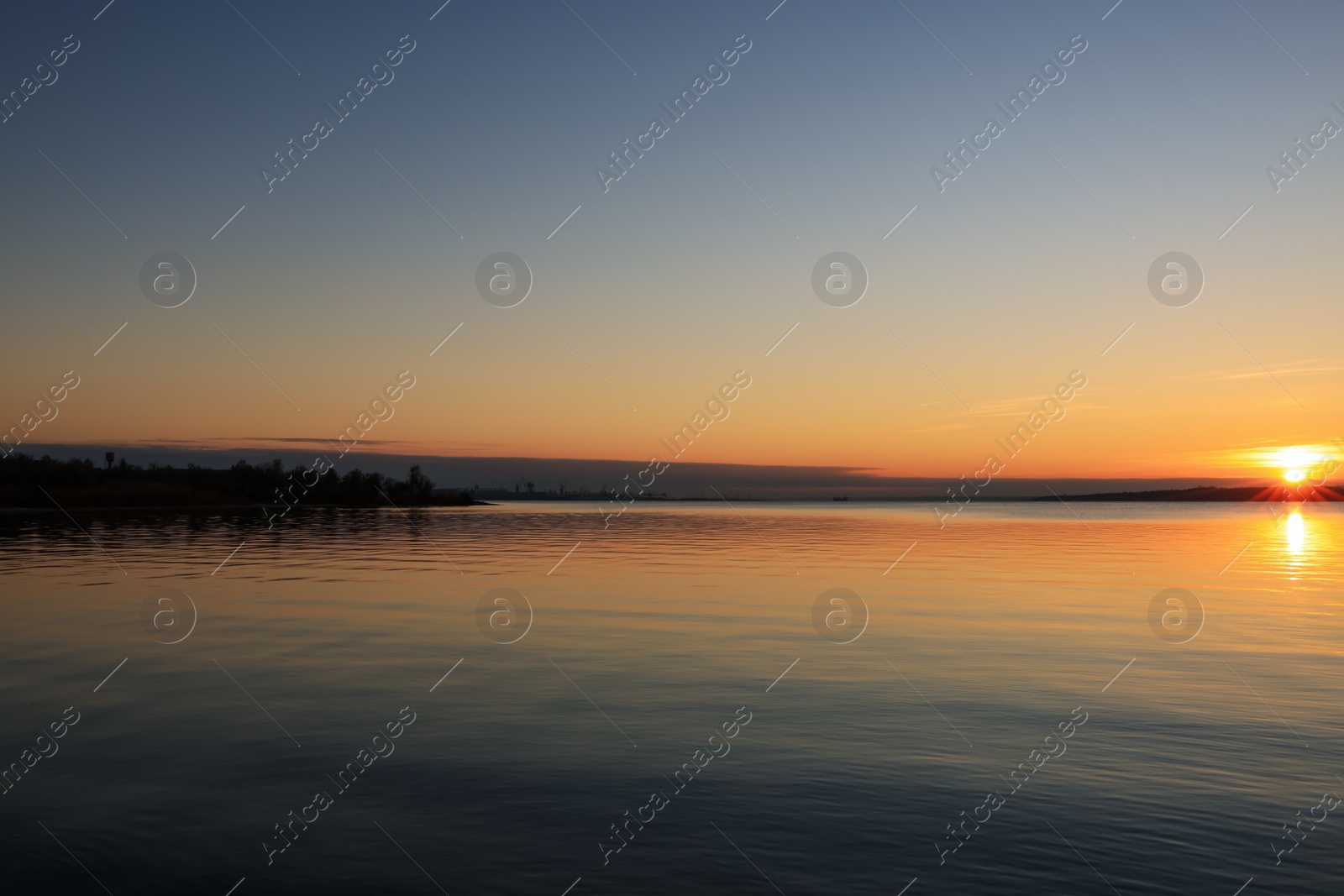 Photo of Picturesque view of beautiful riverside during sunset