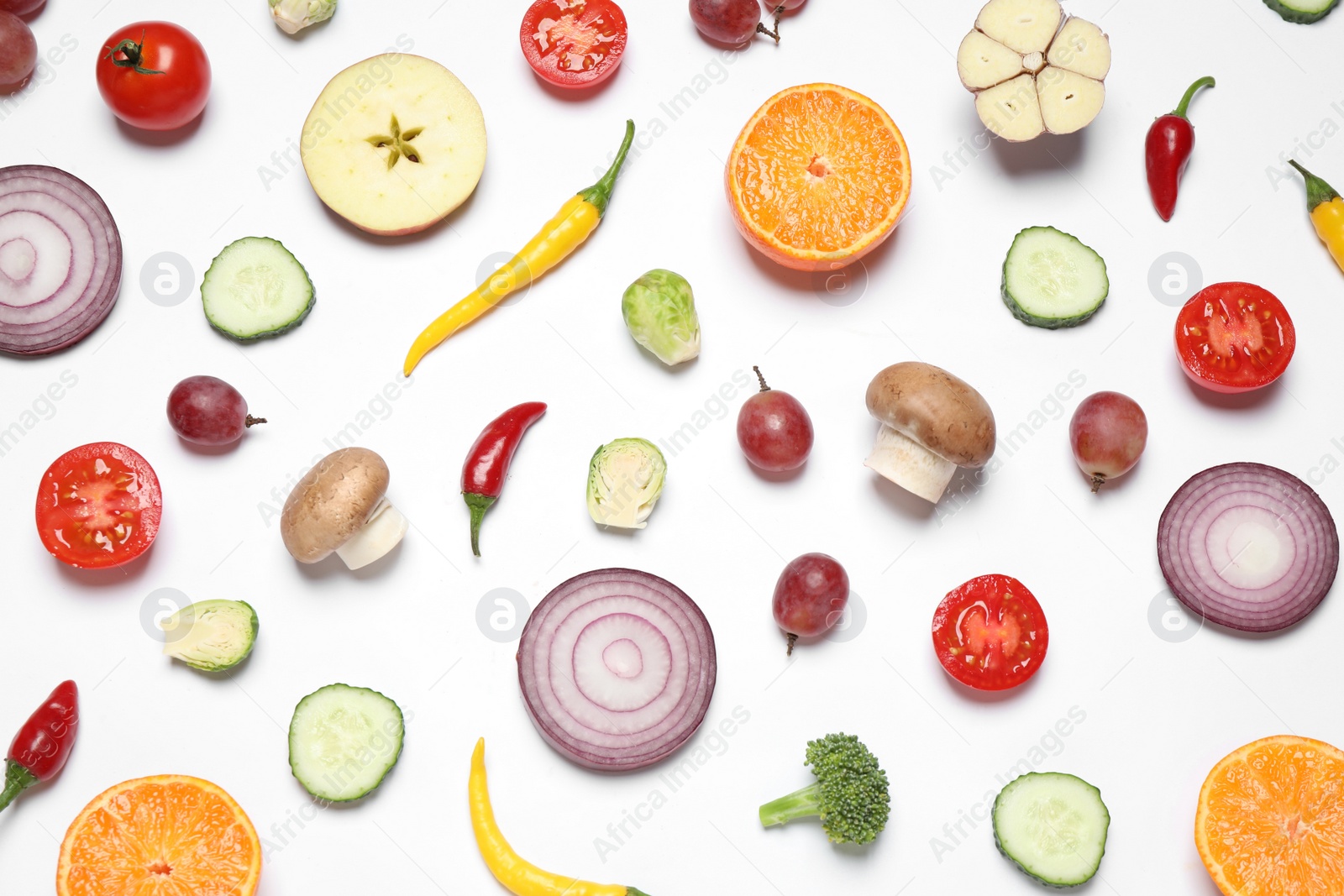 Photo of Fresh organic fruits and vegetables on white background, flat lay