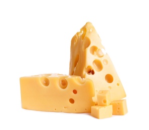 Pieces of cheese with holes on white background