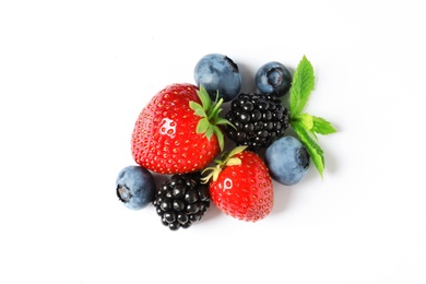 Photo of Strawberries, blackberries and blueberries on white background