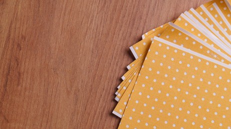 Pepper plasters on wooden table, flat lay. Space for text