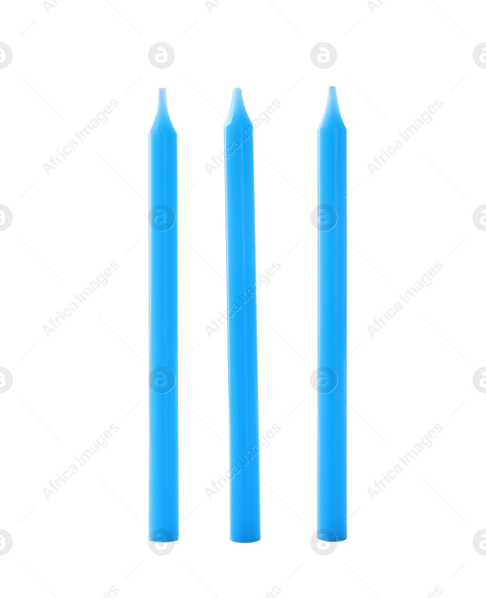 Photo of Blue thin birthday candles isolated on white