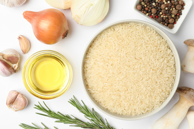 Photo of Different ingredients on white background, top view. Risotto recipe