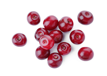Bunch of juicy cherries on white background, top view