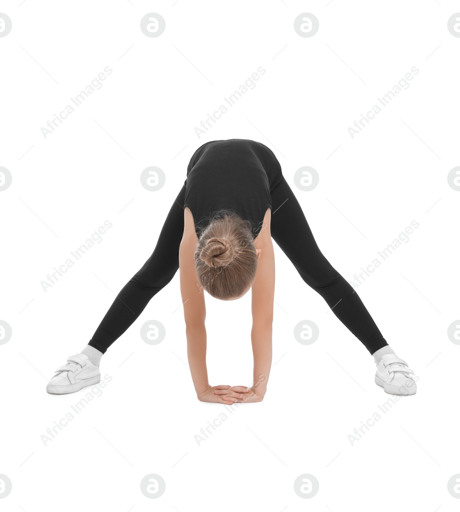 Photo of Little girl doing morning exercise on white background