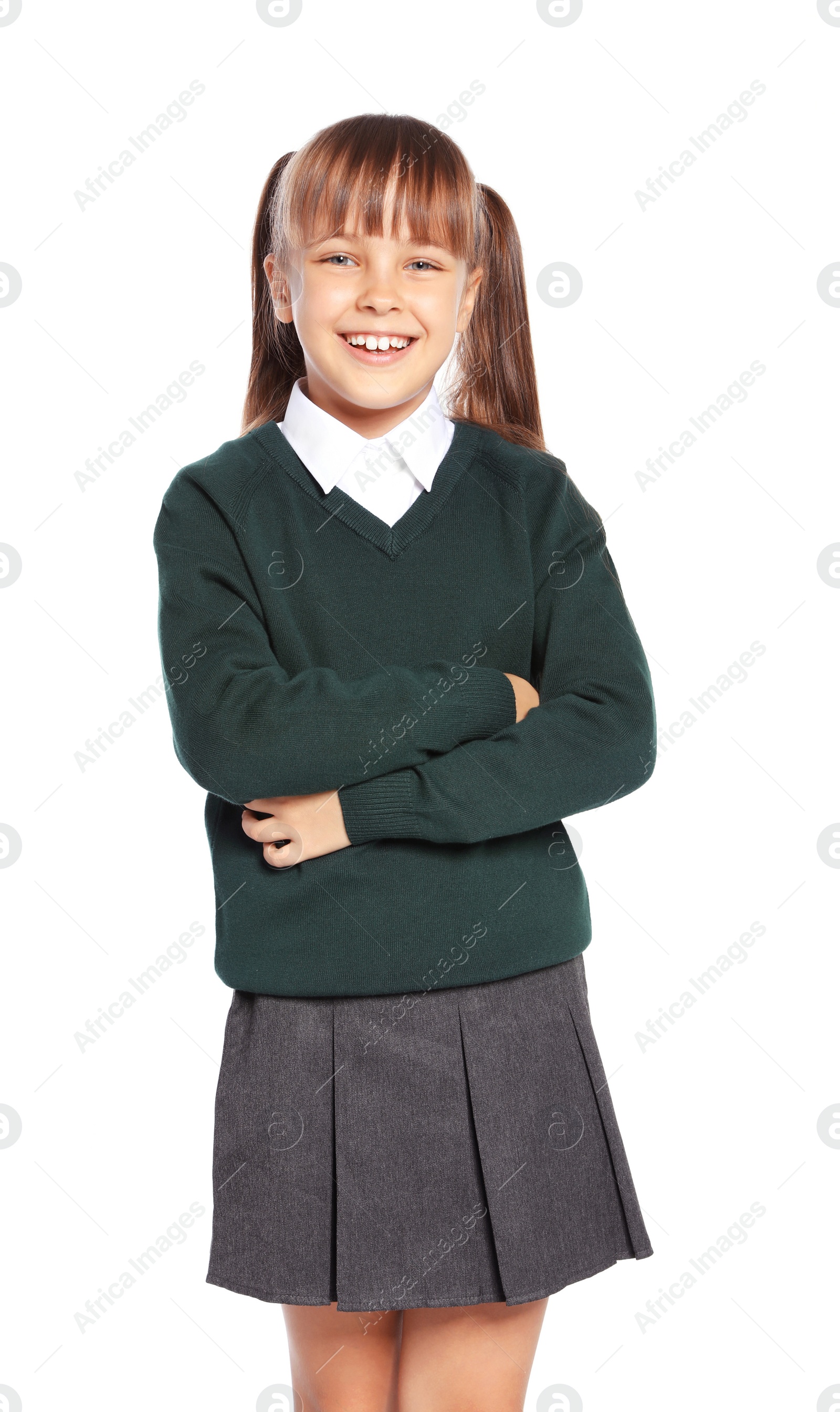 Photo of Little girl in stylish school uniform on white background