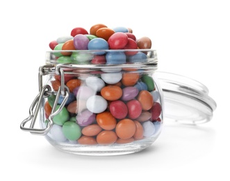Photo of Delicious bright candies in glass jar isolated on white