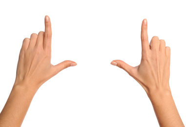 Woman making frame with hands on white background, closeup