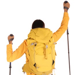 Photo of Female hiker with backpack and trekking poles on white background, back view