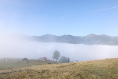 Photo of Beautiful viewlandscape with foggy mountain hills
