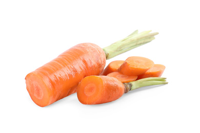 Photo of Cut fresh ripe carrots isolated on white
