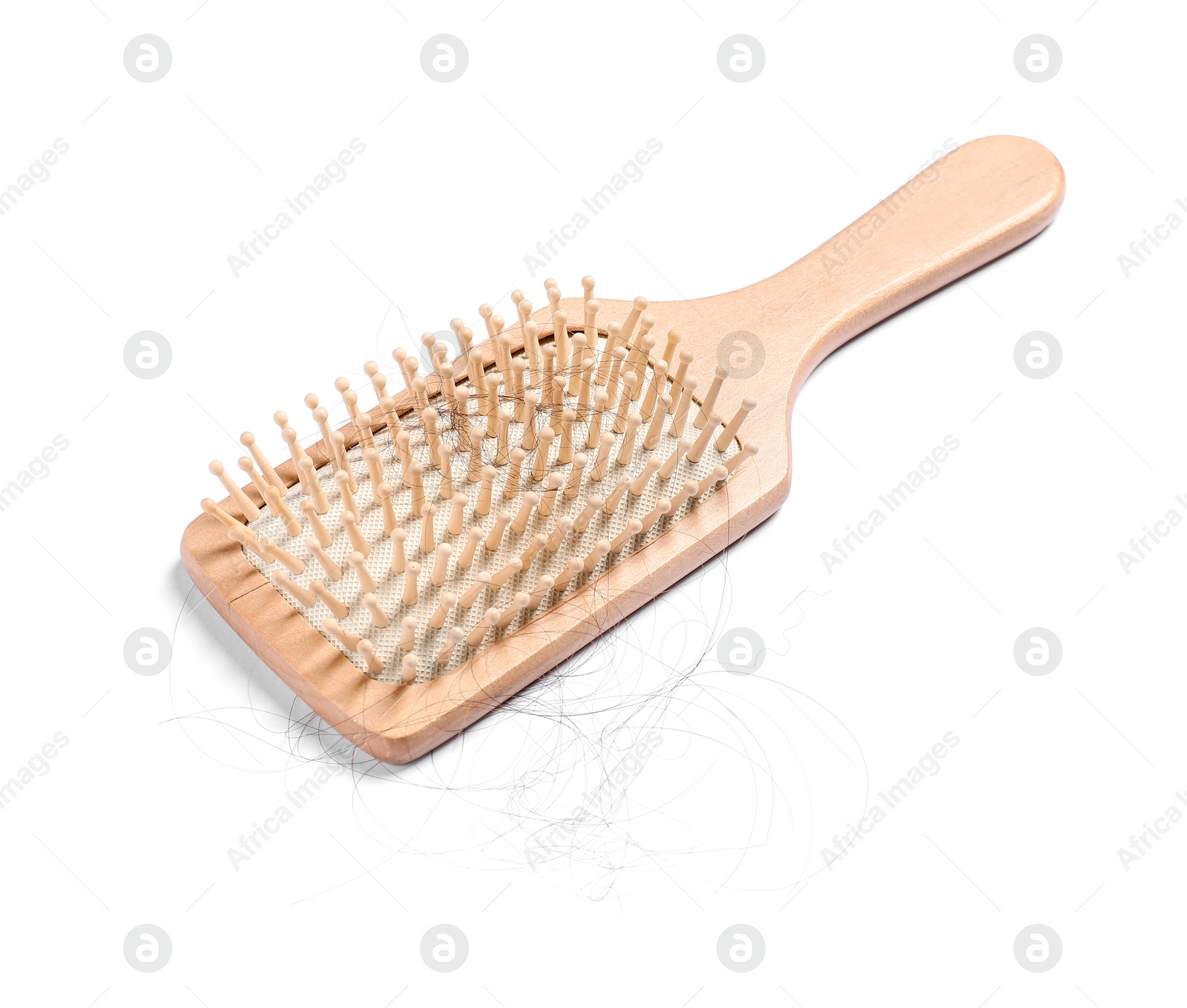 Photo of Wooden brush with lost hair isolated on white