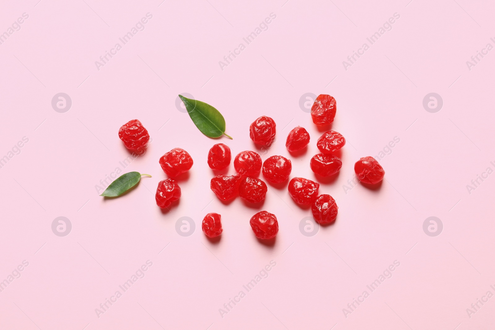 Photo of Cherries on color background, top view. Dried fruit as healthy snack