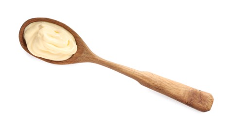 Wooden spoon with tasty mayonnaise isolated on white, top view