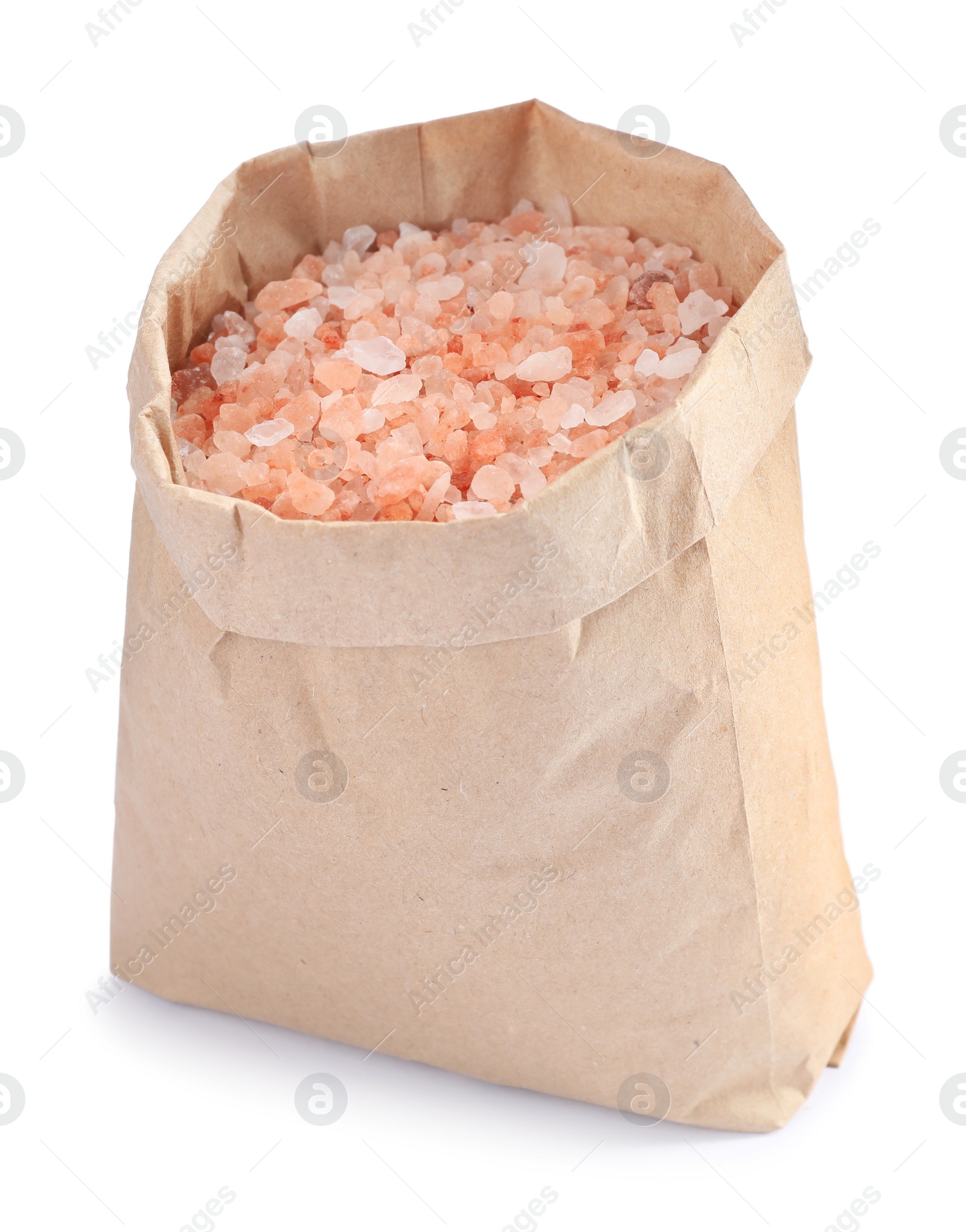 Photo of Pink Himalayan salt in paper bag isolated on white