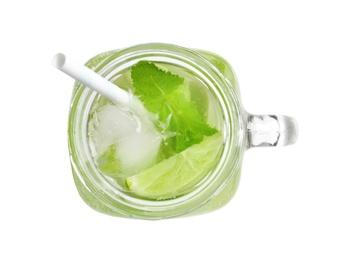 Refreshing beverage with mint and lime in mason jar on white background, top view