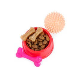 Photo of Pet dry food in bowl, treats and toys on white background. Shop assortment