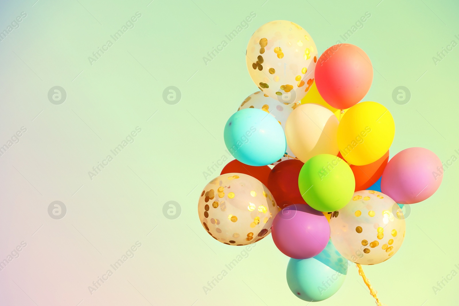 Image of Many bright balloons on color background, space for text. Summer party. Summer party