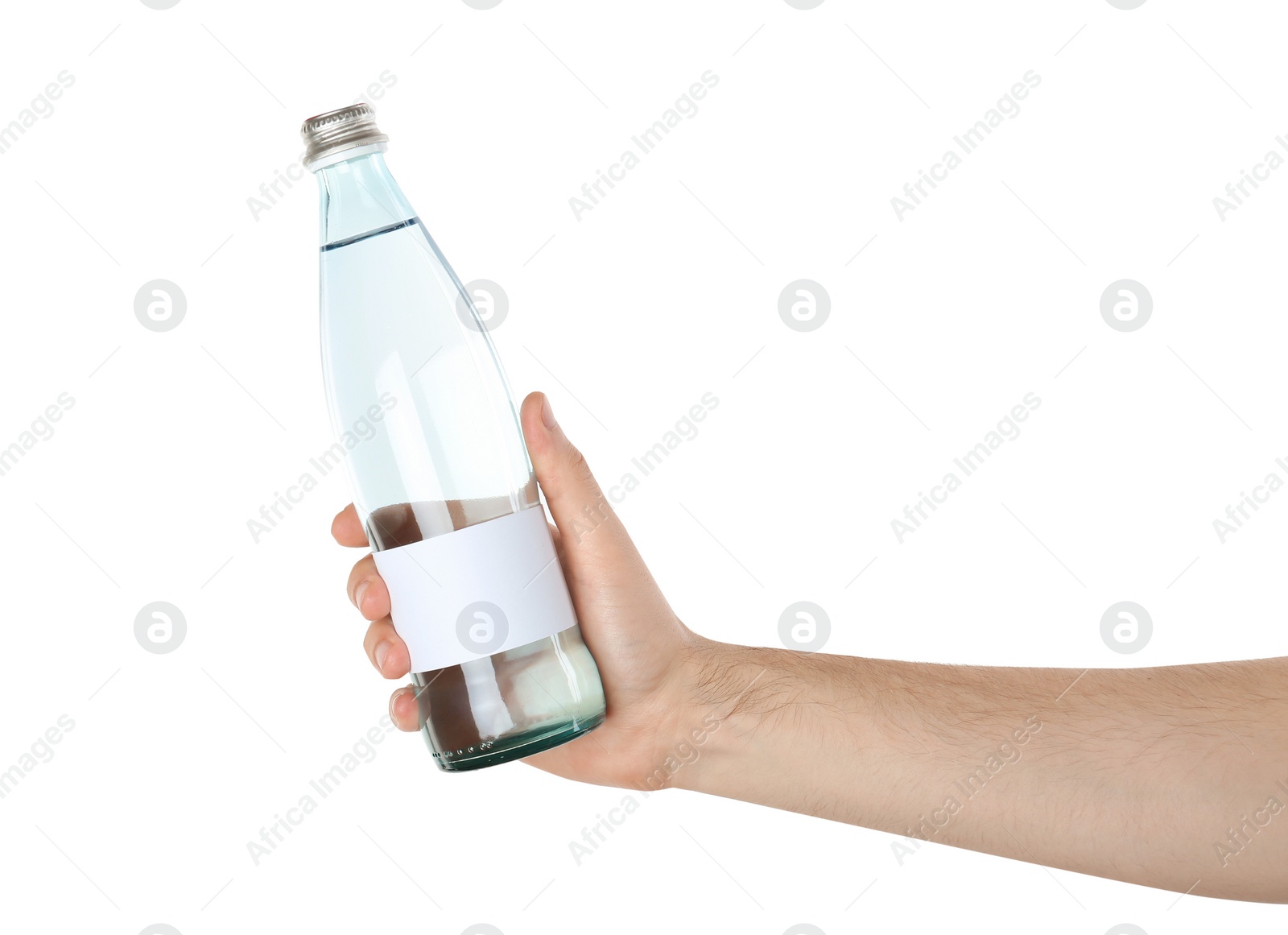 Photo of Man holding glass bottle of pure water with blank tag on white background
