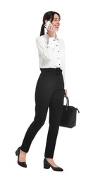Photo of Happy businesswoman with bag talking on smartphone against white background
