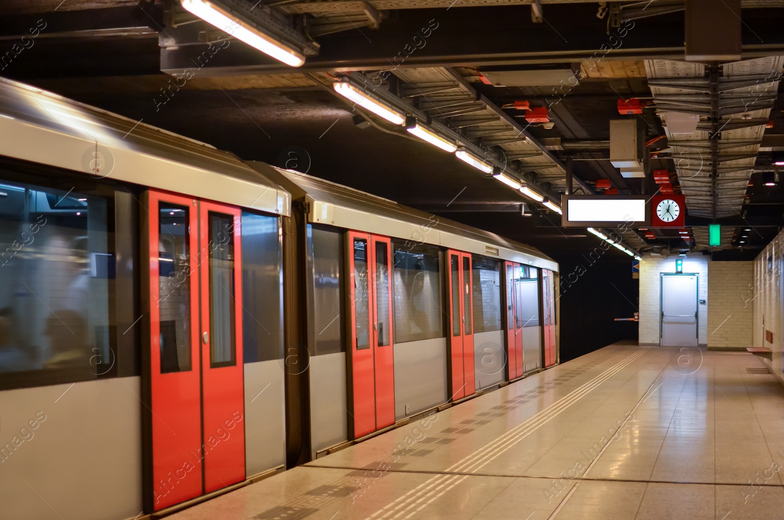 Photo of Beautiful view of modern subway station with train