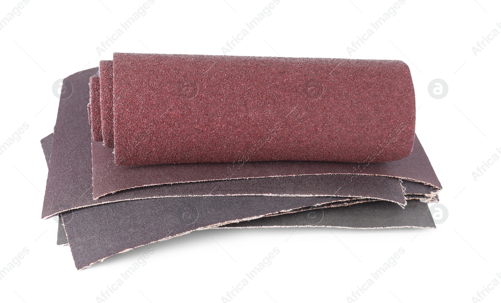 Photo of Many sheets of sandpaper isolated on white