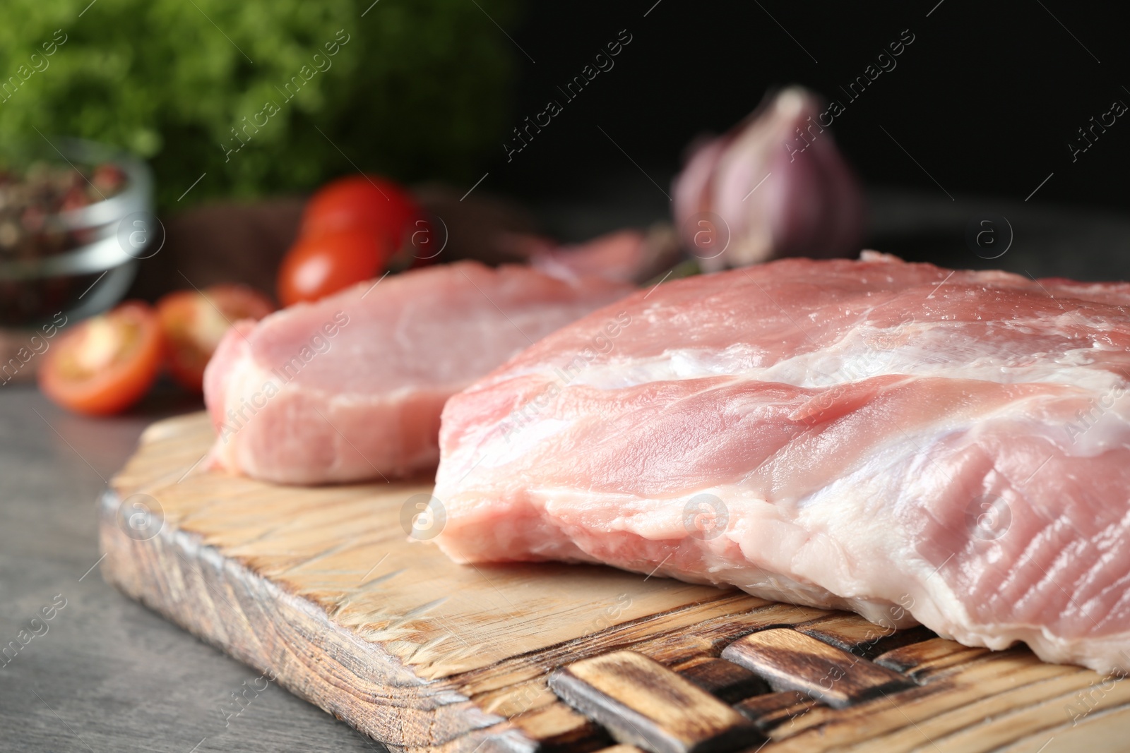 Photo of Fresh raw meat on table, closeup. Space for text