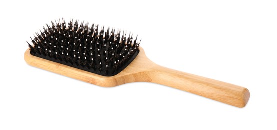 One new wooden hairbrush isolated on white